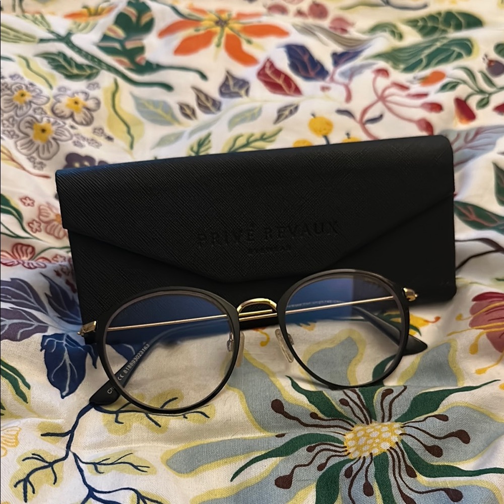 Stylish Black and Gold Glasses with Round Frame